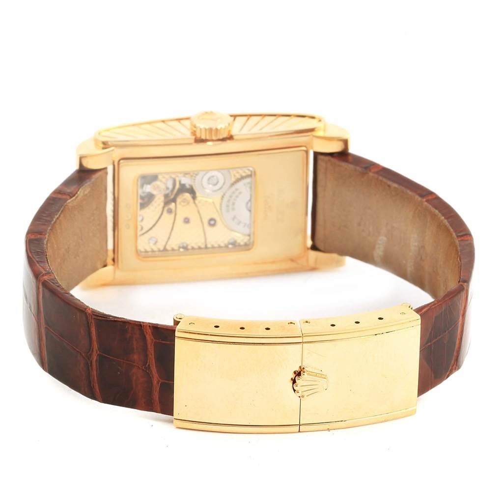 This image shows the back and clasp of a Rolex Cellini 5440.8 Men's Yellow Gold Champagne Dial 5440.8 Men's Yellow Gold Champagne Dial watch, highlighting the visible movement through the case back.