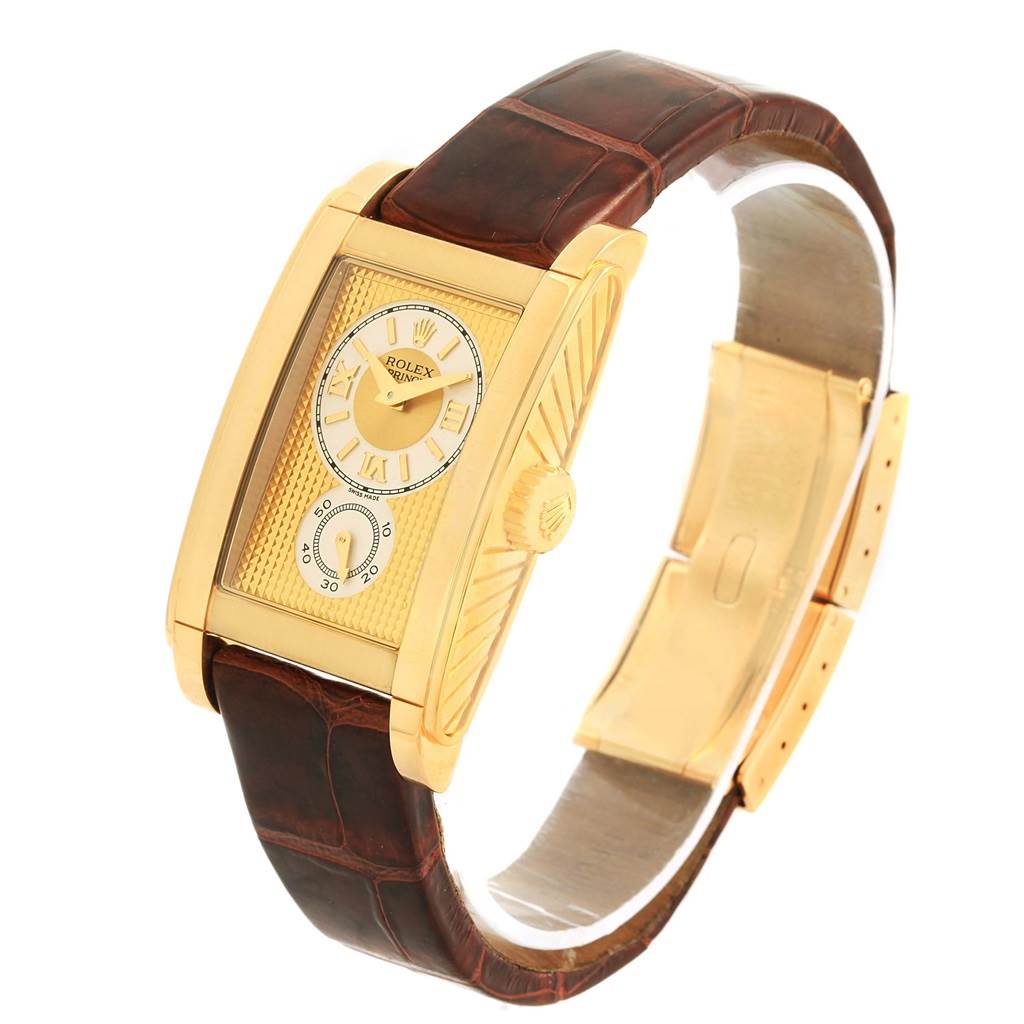 The image shows a Rolex Cellini 5440.8 Men's Yellow Gold Champagne Dial 5440.8 Men's Yellow Gold Champagne Dial watch at an angled side view, highlighting its leather strap and rectangular face.