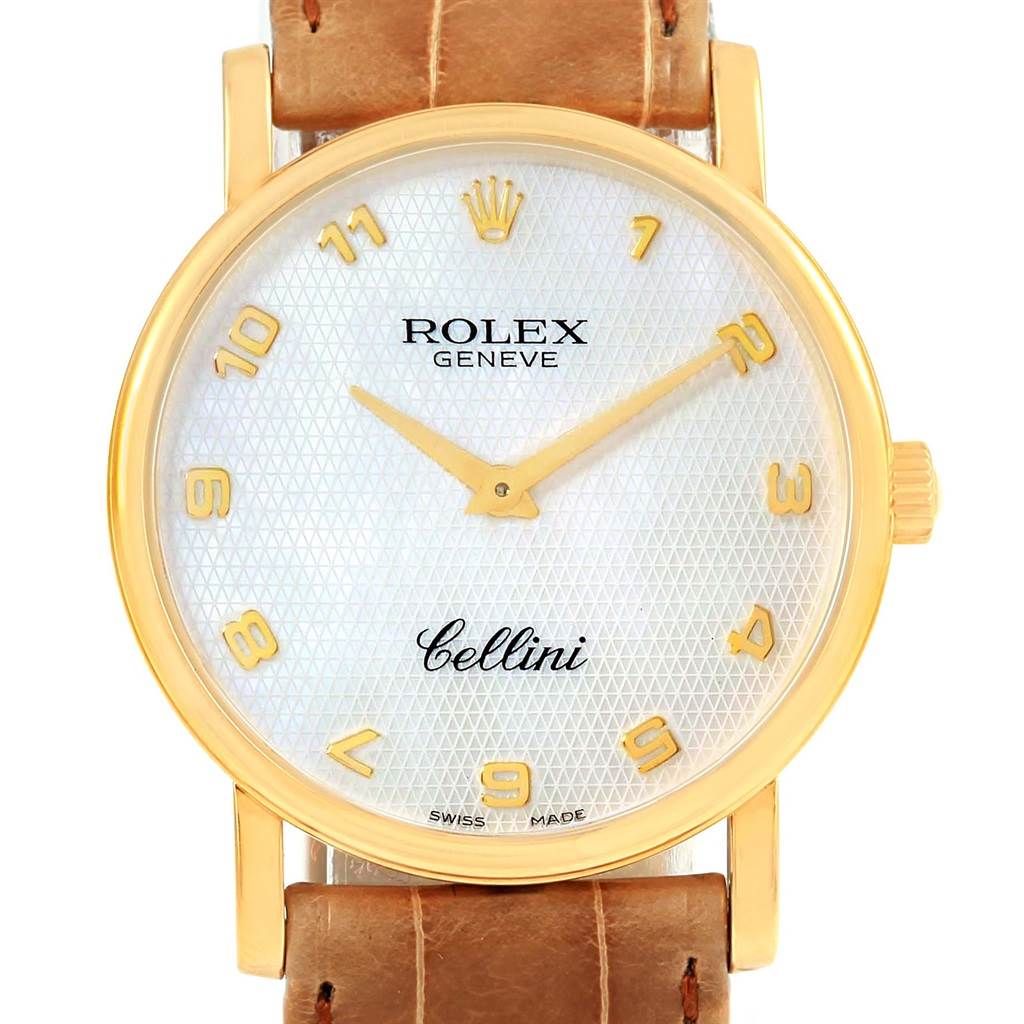 The Rolex Cellini 5115 Yellow Gold Mother of Pearl Dial 5115 Yellow Gold Mother of Pearl Dial watch is shown from a front angle, displaying its dial, hands, bezel, and part of the leather strap.