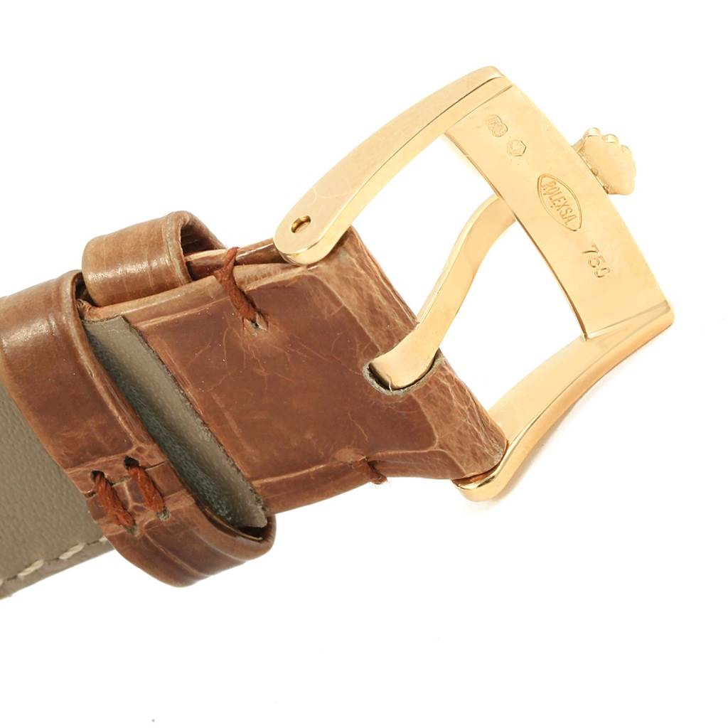 The image shows a close-up of the buckle and part of the leather strap of a Rolex Cellini 5115 Yellow Gold Mother of Pearl Dial 5115 Yellow Gold Mother of Pearl Dial watch.