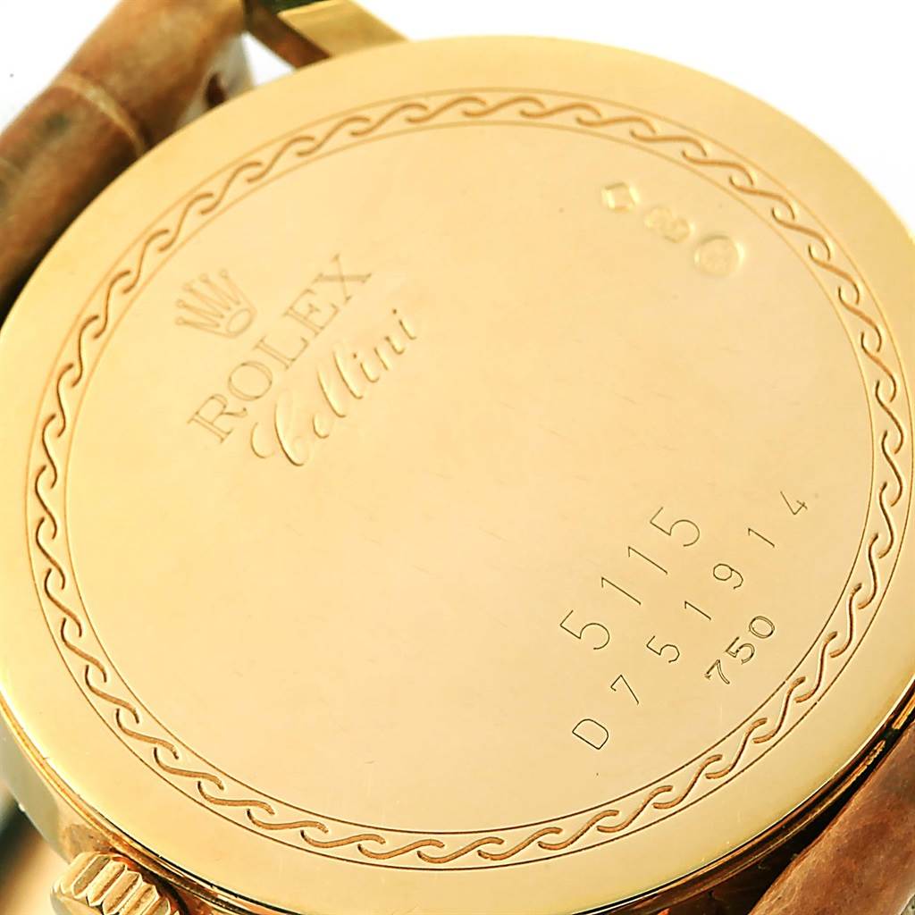 The image shows the back case of a Rolex Cellini 5115 Yellow Gold Mother of Pearl Dial 5115 Yellow Gold Mother of Pearl Dial watch, highlighting engravings and detailing.