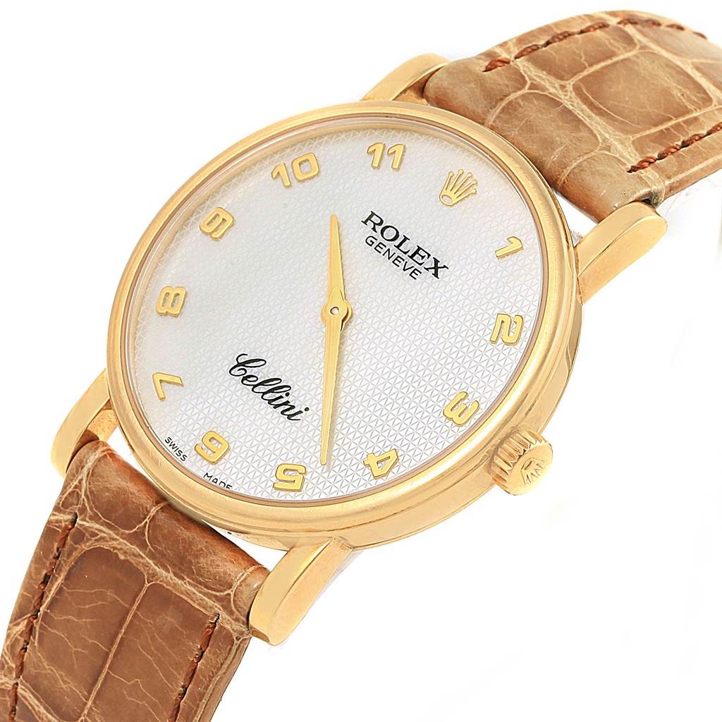 This image shows a Rolex Cellini 5115 Yellow Gold Mother of Pearl Dial 5115 Yellow Gold Mother of Pearl Dial watch at an angle that highlights its face, bezel, crown, and strap with a close-up view.