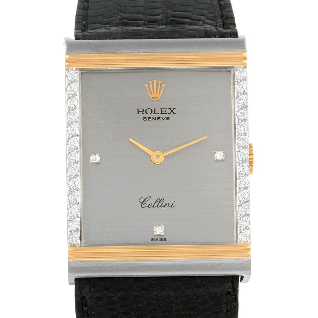 The image shows a front view of a Rolex Cellini 4127 Men's Yellow Gold Silver Dial 4127 Men's Yellow Gold Silver Dial watch, highlighting its rectangular dial, diamond accents, and black strap.