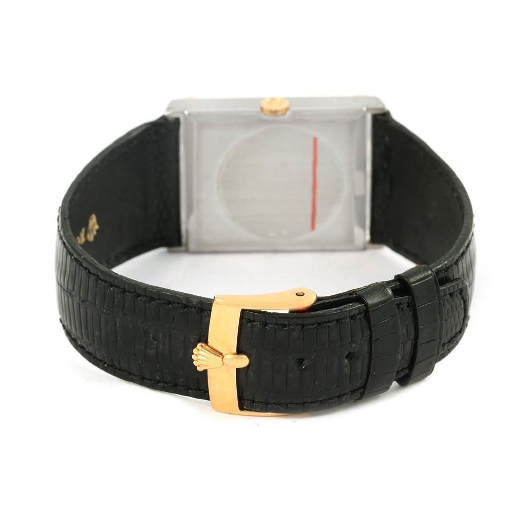 The image shows the back of a Rolex Cellini 4127 Men's Yellow Gold Silver Dial 4127 Men's Yellow Gold Silver Dial watch, focusing on the black leather strap and gold buckle.