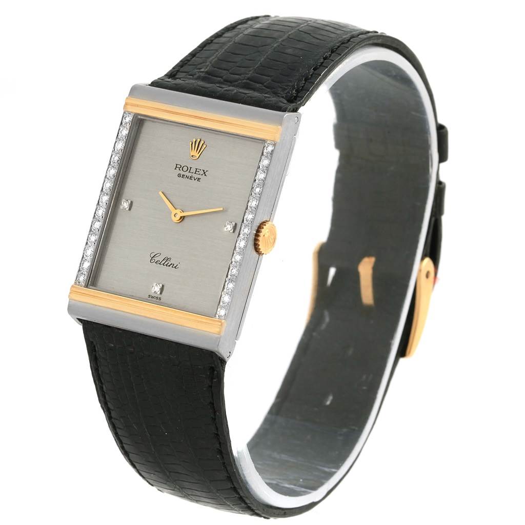 This Rolex Cellini 4127 Men's Yellow Gold Silver Dial 4127 Men's Yellow Gold Silver Dial watch is shown at a three-quarter angle, highlighting its rectangular face, black leather strap, and gold accents.