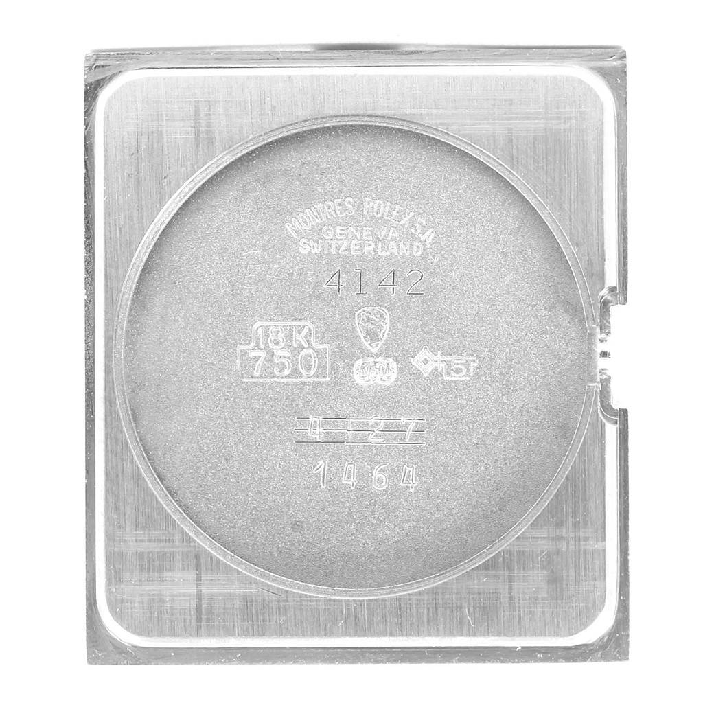 The image shows the back case of a Rolex Cellini 4127 Men's Yellow Gold Silver Dial 4127 Men's Yellow Gold Silver Dial watch, featuring inscriptions and markings on it.