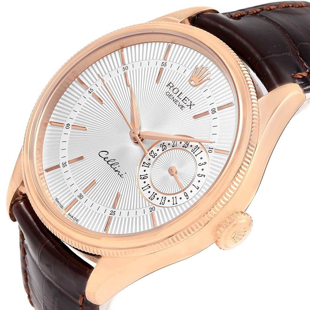 The image shows a close-up angle of the Rolex Cellini 50515 Men's Rose Gold Silver Dial 50515 Men's Rose Gold Silver Dial watch, highlighting its dial, hands, and crown, along with part of the leather strap.
