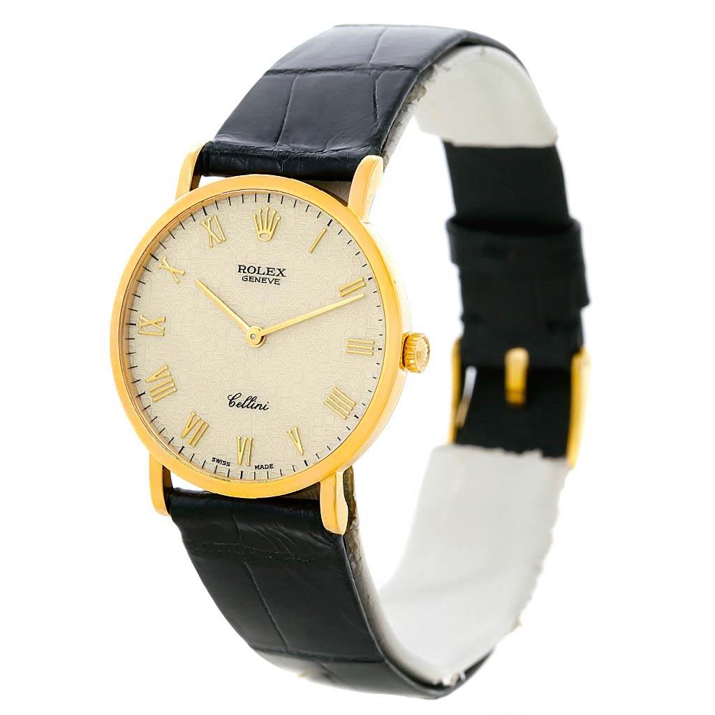 The Rolex Cellini 5112 Men
s Beige Dial 5112 Men
s Beige Dial watch is shown at an angled front view, displaying its dial, case, crown, and leather strap.