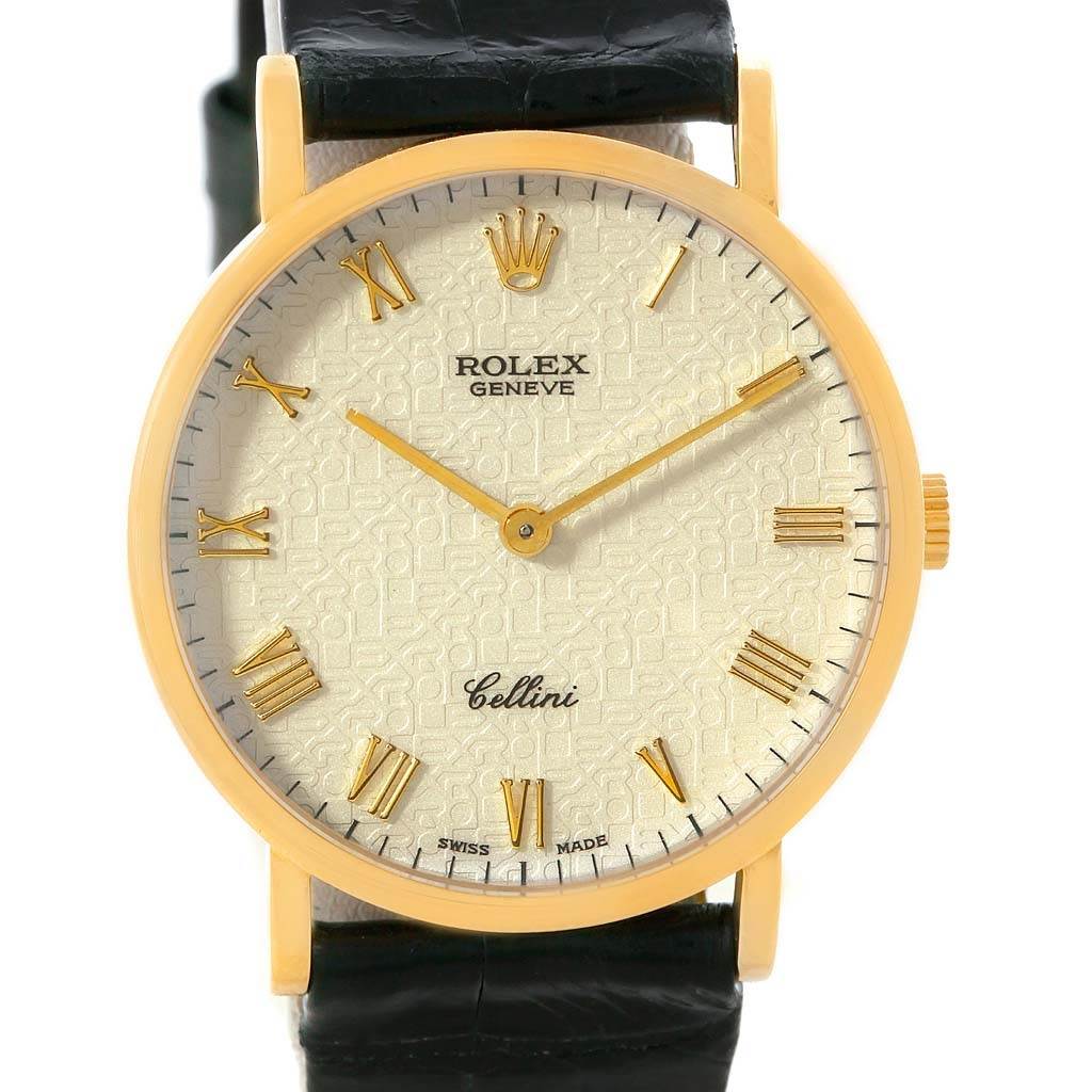 The image shows a front view of the Rolex Cellini 5112 Men
s Beige Dial 5112 Men
s Beige Dial watch displaying its dial, hands, and part of the strap.