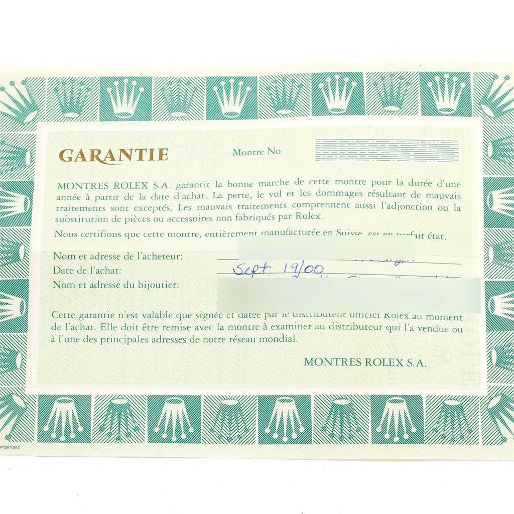 The image shows a warranty certificate for a Rolex Cellini 5112 Men
s Beige Dial 5112 Men
s Beige Dial model watch, featuring text and the Rolex logo.