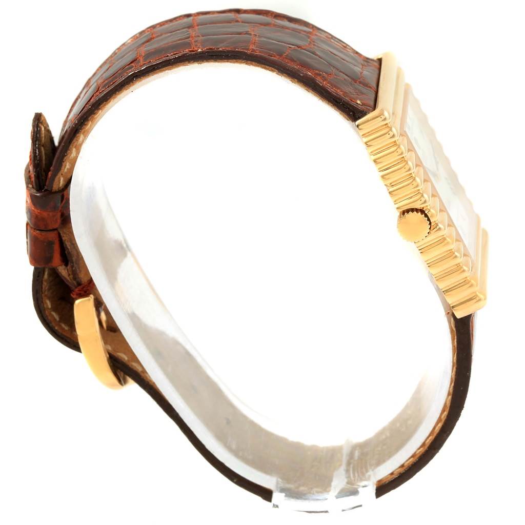 The image shows a side view of a Rolex Cellini 4015 Men's Yellow Gold White Dial 4015 Men's Yellow Gold White Dial watch, highlighting the leather strap and the gold crown and bezel.