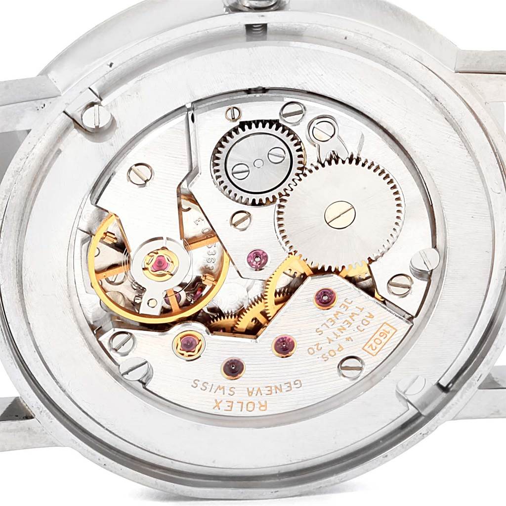 This image shows the intricate movement and internal mechanics of a Rolex Cellini 5115 Men
s White Gold Silver Dial 5115 Men
s White Gold Silver Dial watch from a back angle.