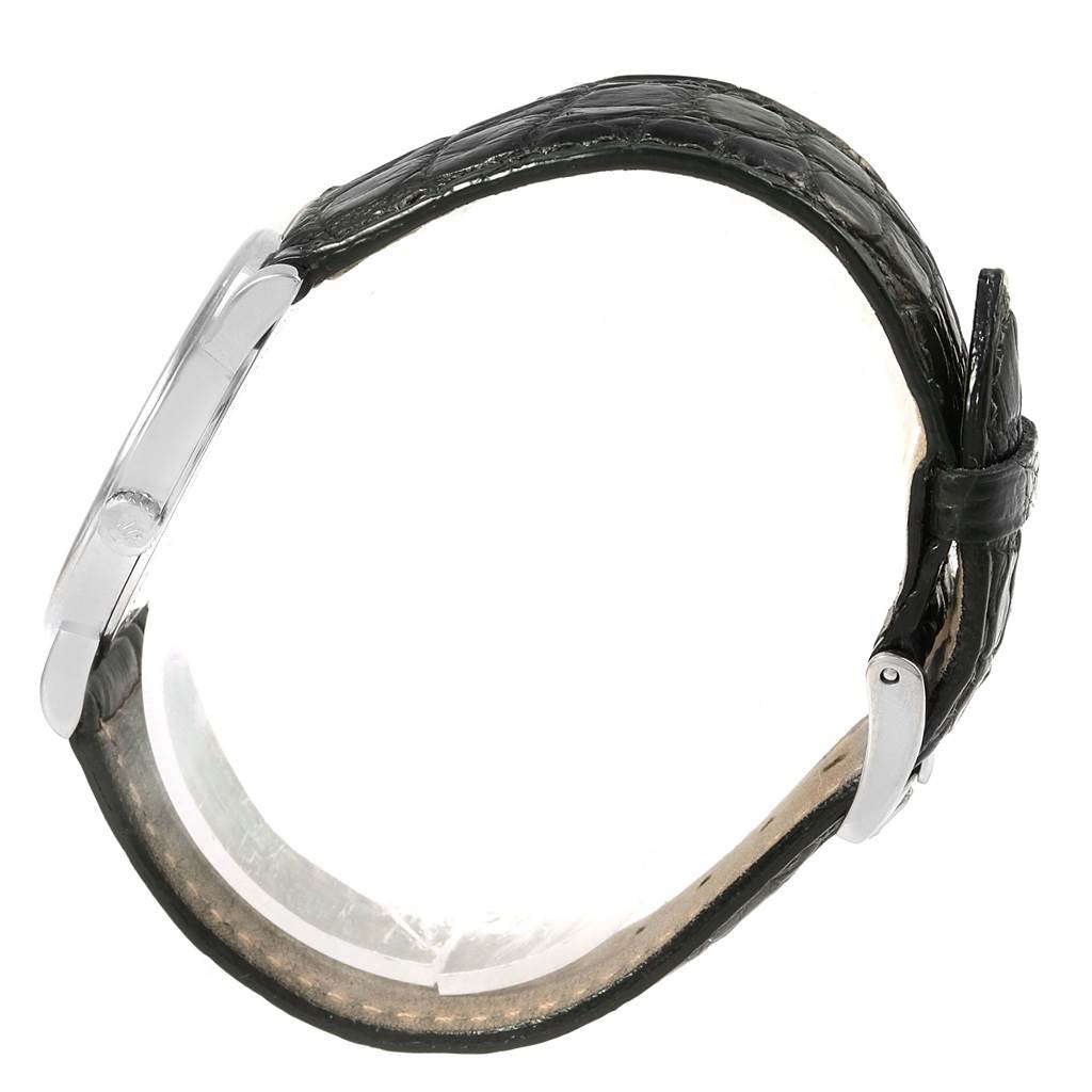 The Rolex Cellini 5115 Men
s White Gold Silver Dial 5115 Men
s White Gold Silver Dial watch is shown in a side profile angle, highlighting its leather strap and metal case.