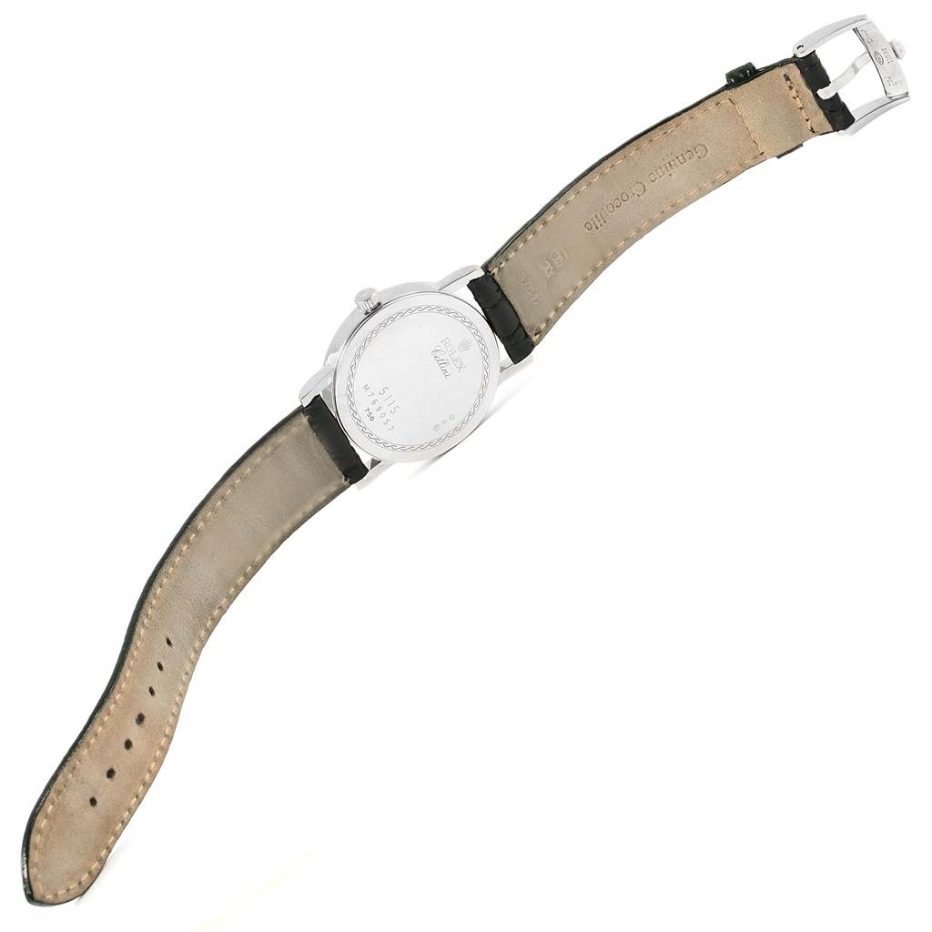 The image shows a Rolex Cellini 5115 Men
s White Gold Silver Dial 5115 Men
s White Gold Silver Dial model watch from the back, displaying the case back and leather strap.