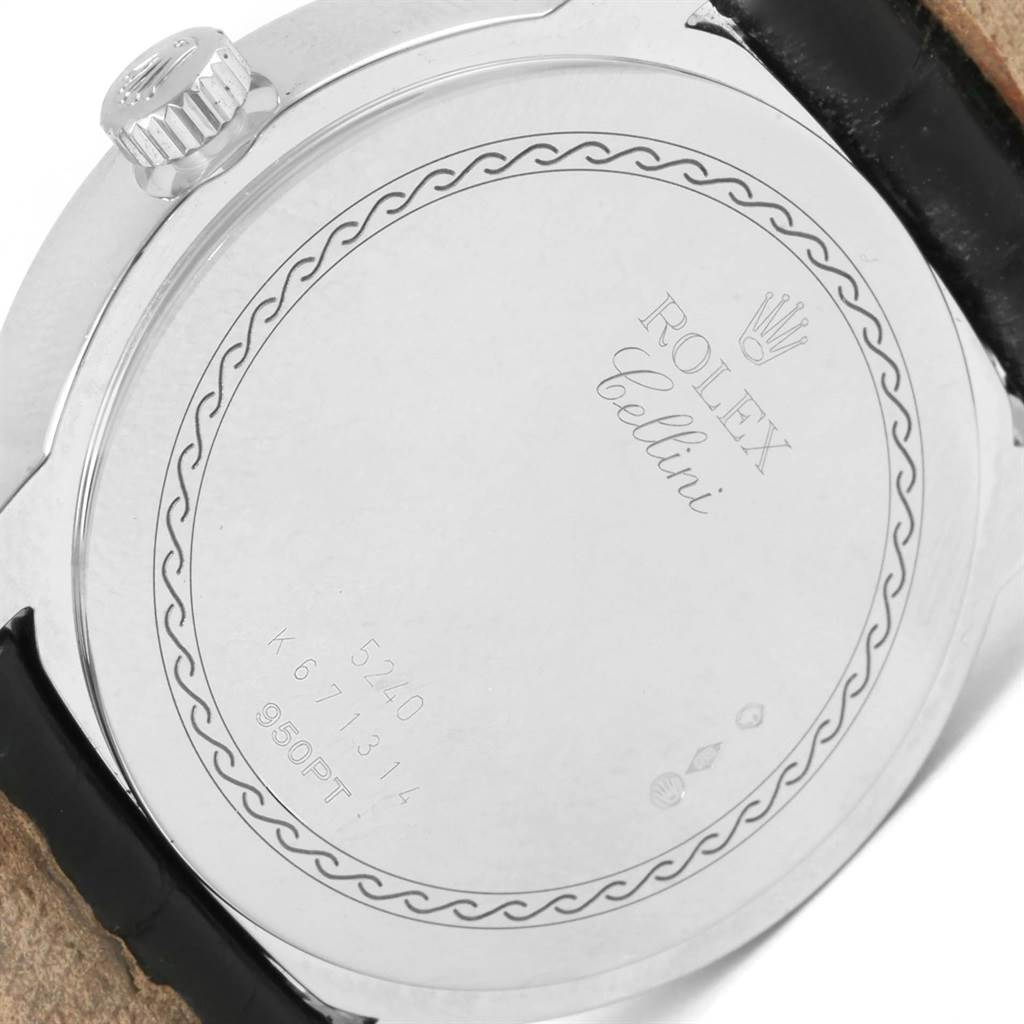 The image shows the back case and crown of a Rolex Cellini 5240 Men's Platinum Mother of Pearl Dial 5240 Men's Platinum Mother of Pearl Dial watch, highlighting its engraving and markings.