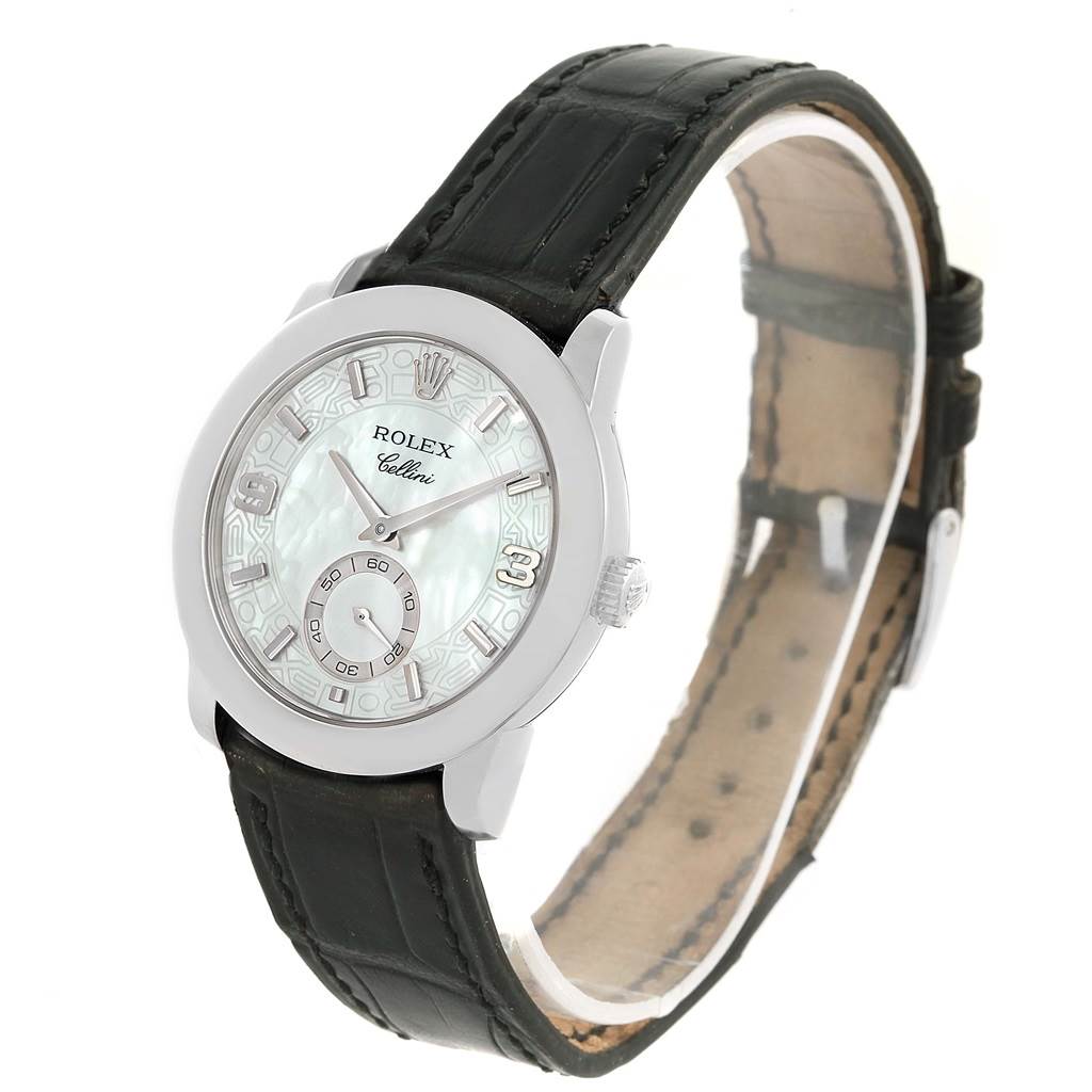The Rolex Cellini 5240 Men's Platinum Mother of Pearl Dial 5240 Men's Platinum Mother of Pearl Dial watch is shown at an angled view, highlighting its face, bezel, and leather strap.