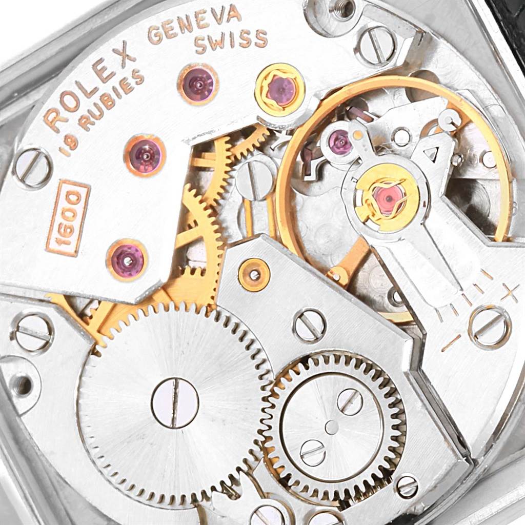 The image shows an up-close view of the internal mechanical movement of a Rolex Cellini 4014 Men's White Gold Silver Dial 4014 Men's White Gold Silver Dial watch.
