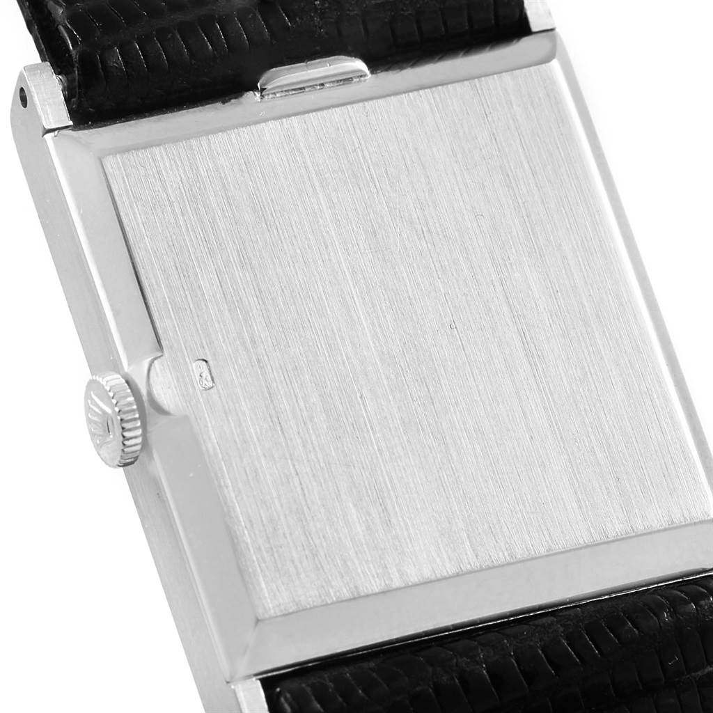 This image shows the back case and a portion of the strap of a Rolex Cellini 4014 Men's White Gold Silver Dial 4014 Men's White Gold Silver Dial watch from a side angle.