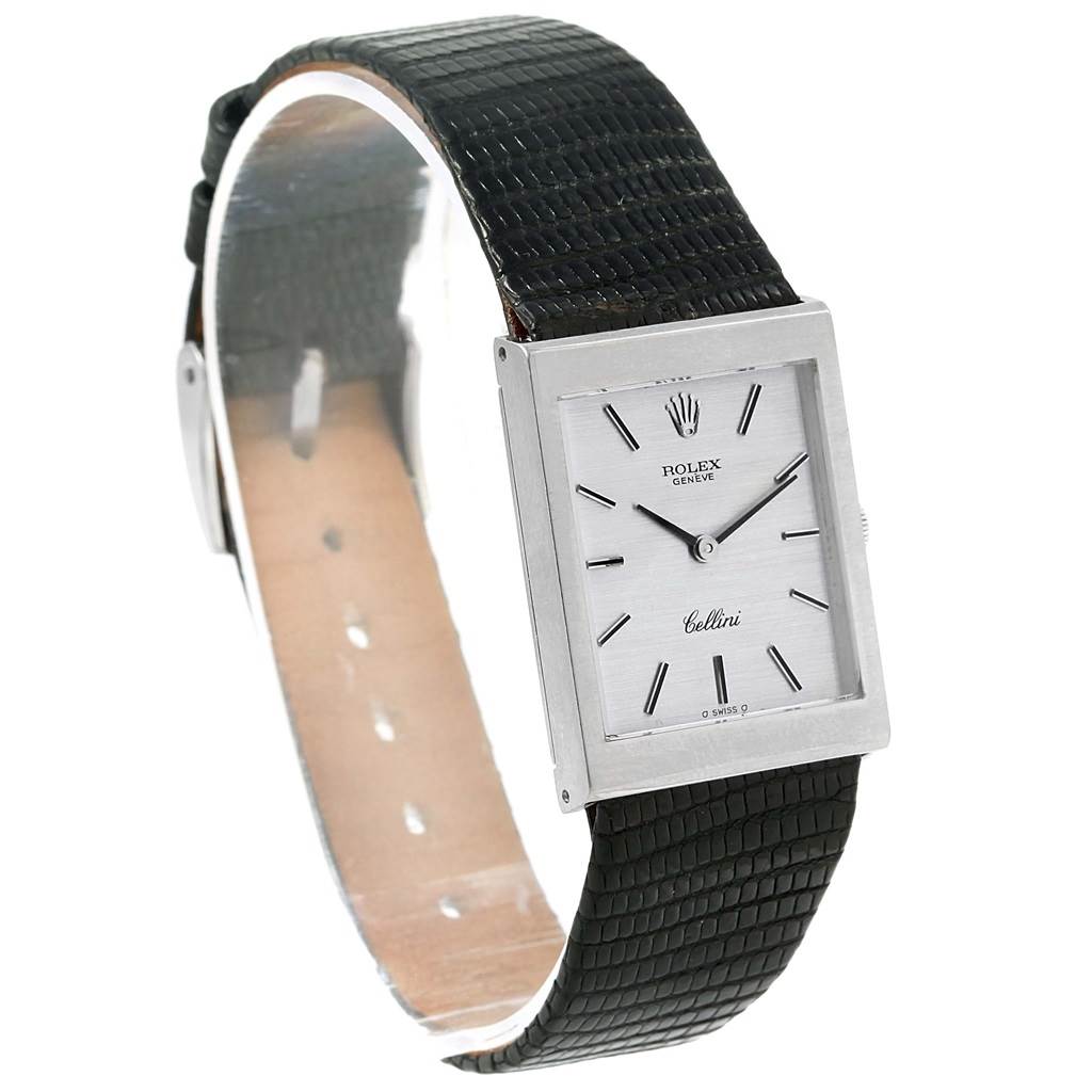 The image shows a Rolex Cellini 4014 Men's White Gold Silver Dial 4014 Men's White Gold Silver Dial watch at an angle focusing on the rectangular face and black leather strap.