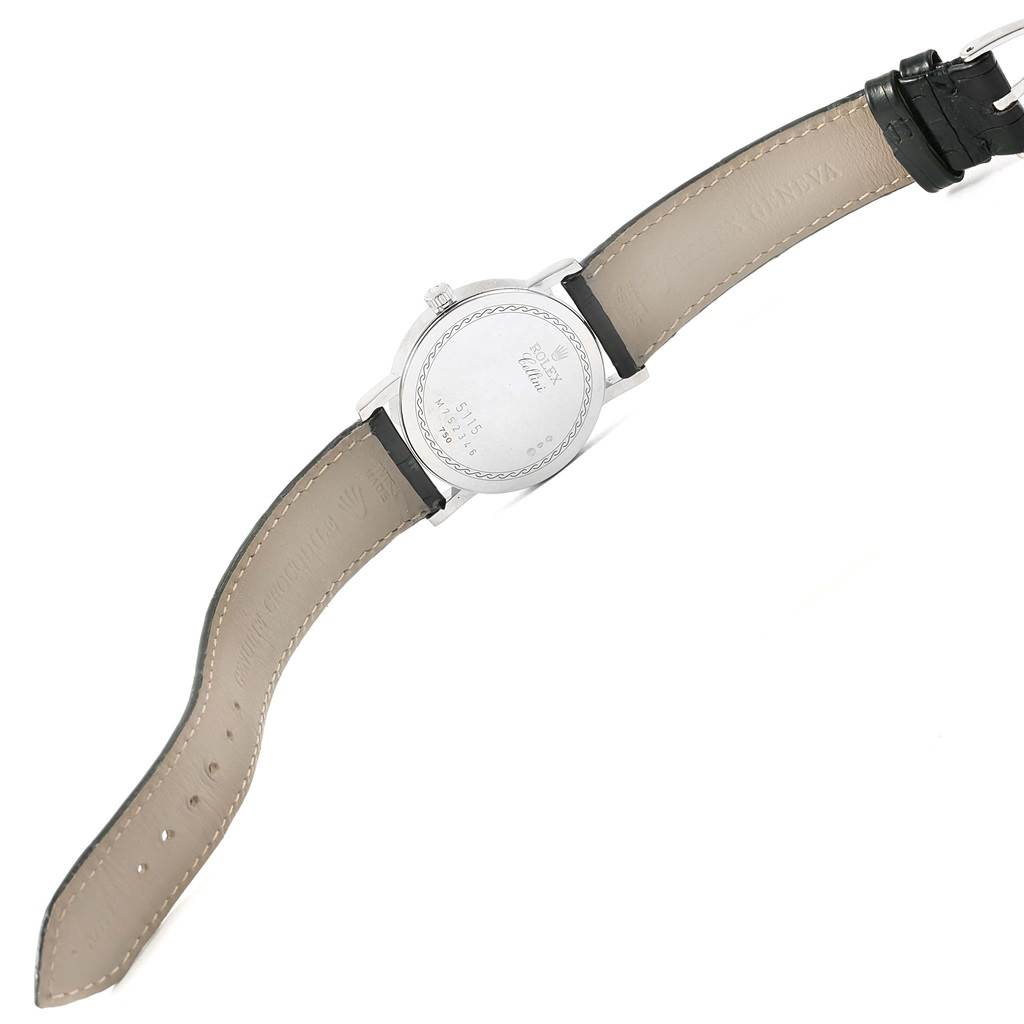 The image shows the back view of a Rolex Cellini 5115 White Gold Black Dial 5115 White Gold Black Dial watch, including the case back and leather straps.