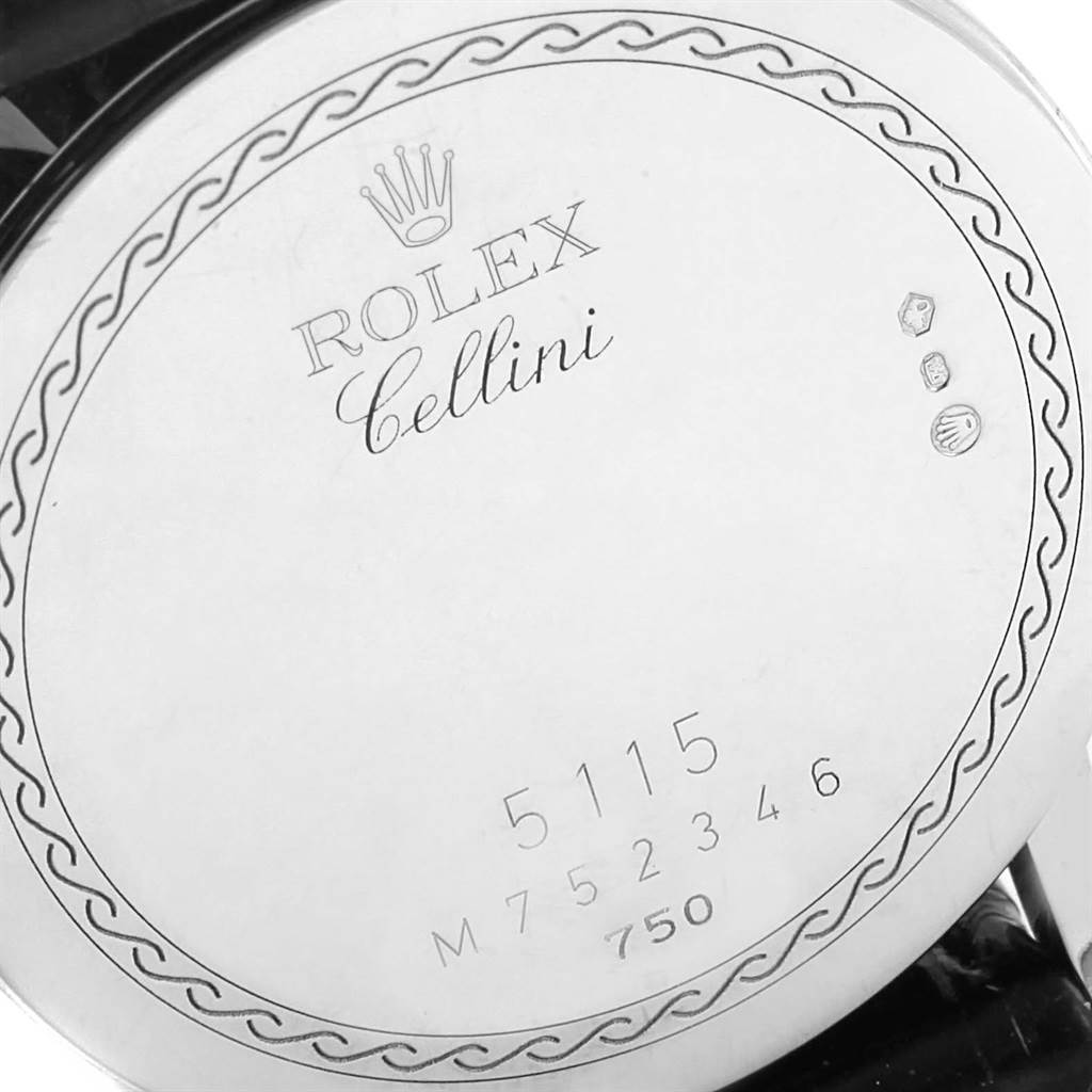 The image shows the back case of a Rolex Cellini 5115 White Gold Black Dial 5115 White Gold Black Dial model watch with its engraved details and serial number visible.