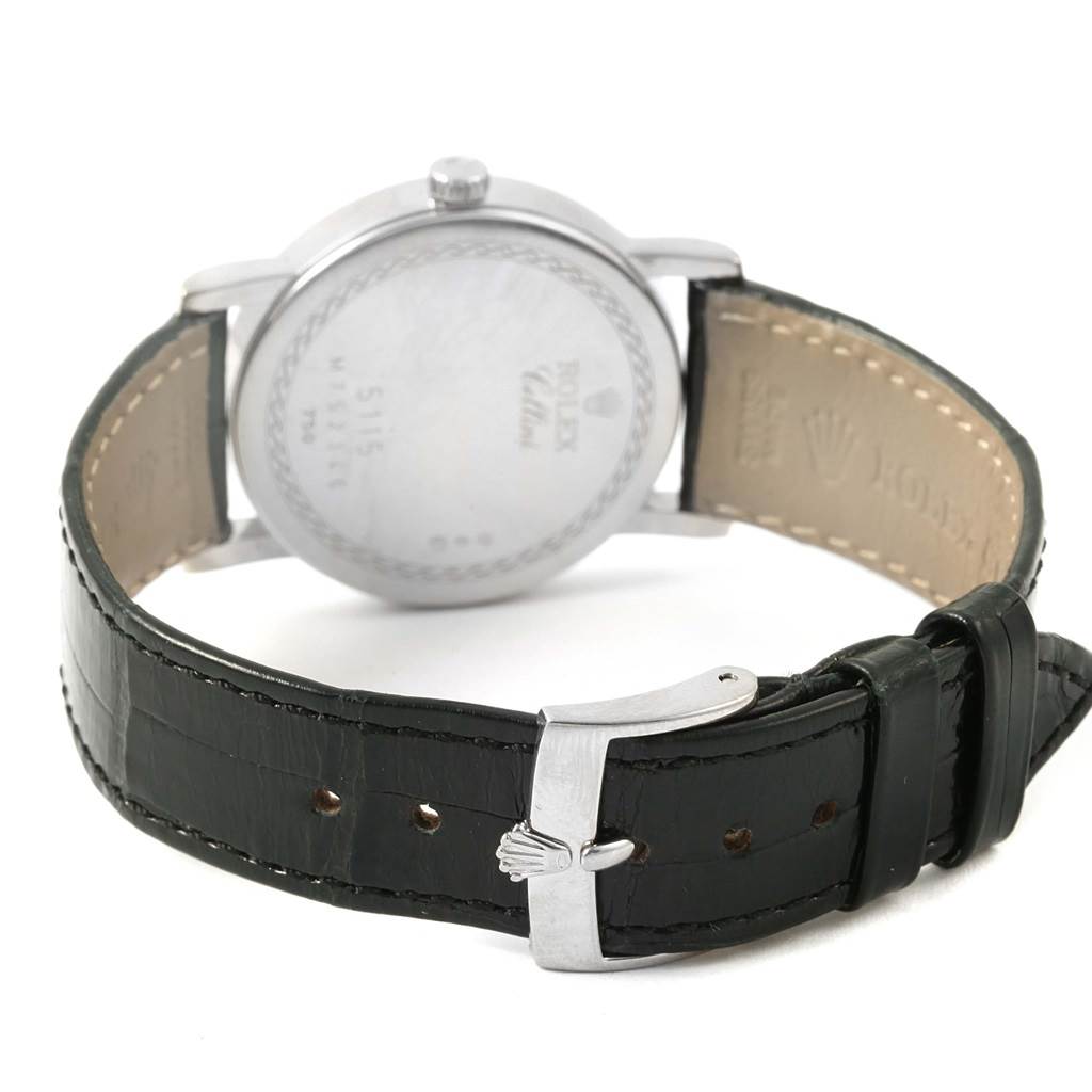 The image shows the back case and leather strap with buckle of a Rolex Cellini 5115 White Gold Black Dial 5115 White Gold Black Dial watch.