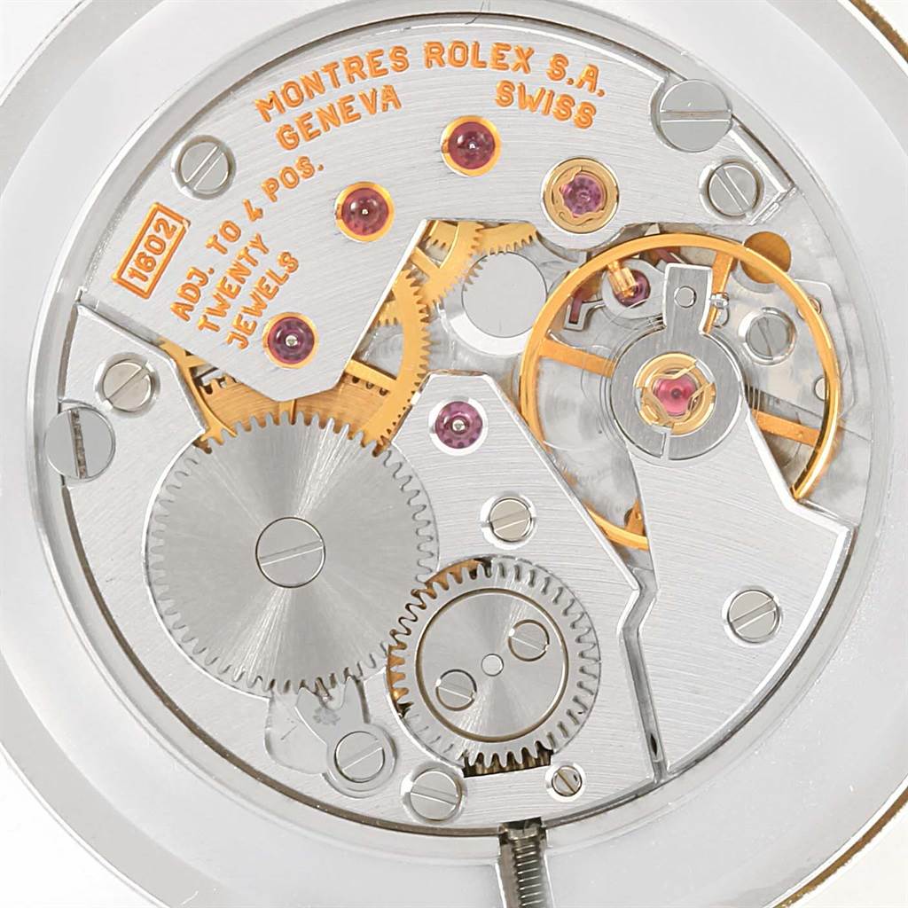 This image shows the open caseback and movement of a Rolex Cellini 5112 Yellow Gold White Dial 5112 Yellow Gold White Dial watch.