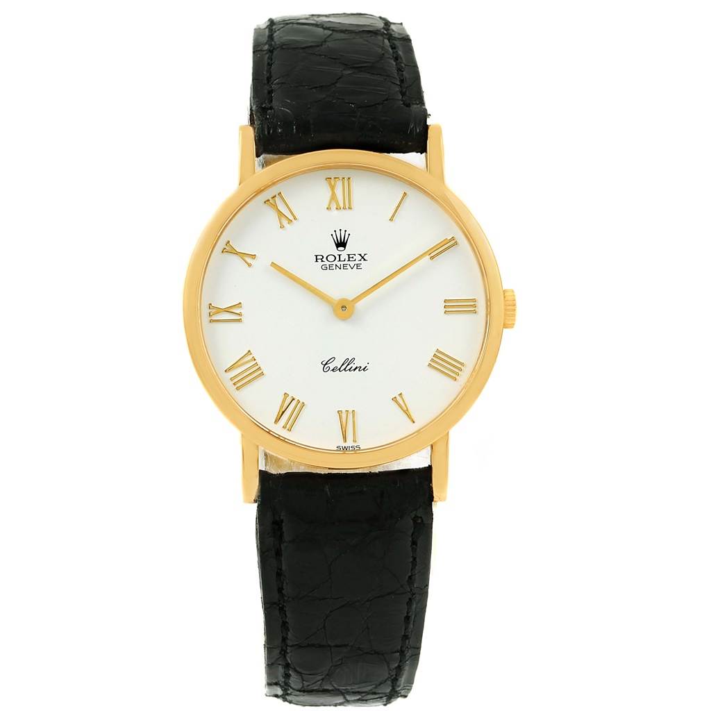 The image shows a Rolex Cellini 5112 Yellow Gold White Dial 5112 Yellow Gold White Dial watch from a front angle, displaying its face, Roman numerals, and leather strap.