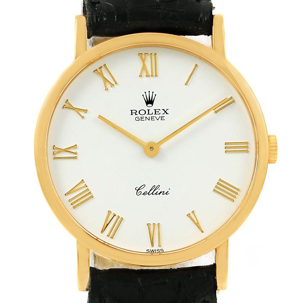 This image shows a front view of a Rolex Cellini 5112 Yellow Gold White Dial 5112 Yellow Gold White Dial watch featuring a white dial with Roman numerals, gold hour markers, and a black leather strap.