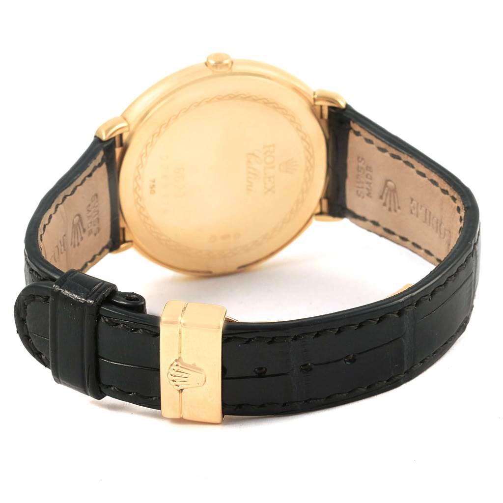 The image shows the rear view of a Rolex Cellini 6623 Men's Yellow Gold White Dial 6623 Men's Yellow Gold White Dial watch, focusing on the black leather strap and gold clasp.