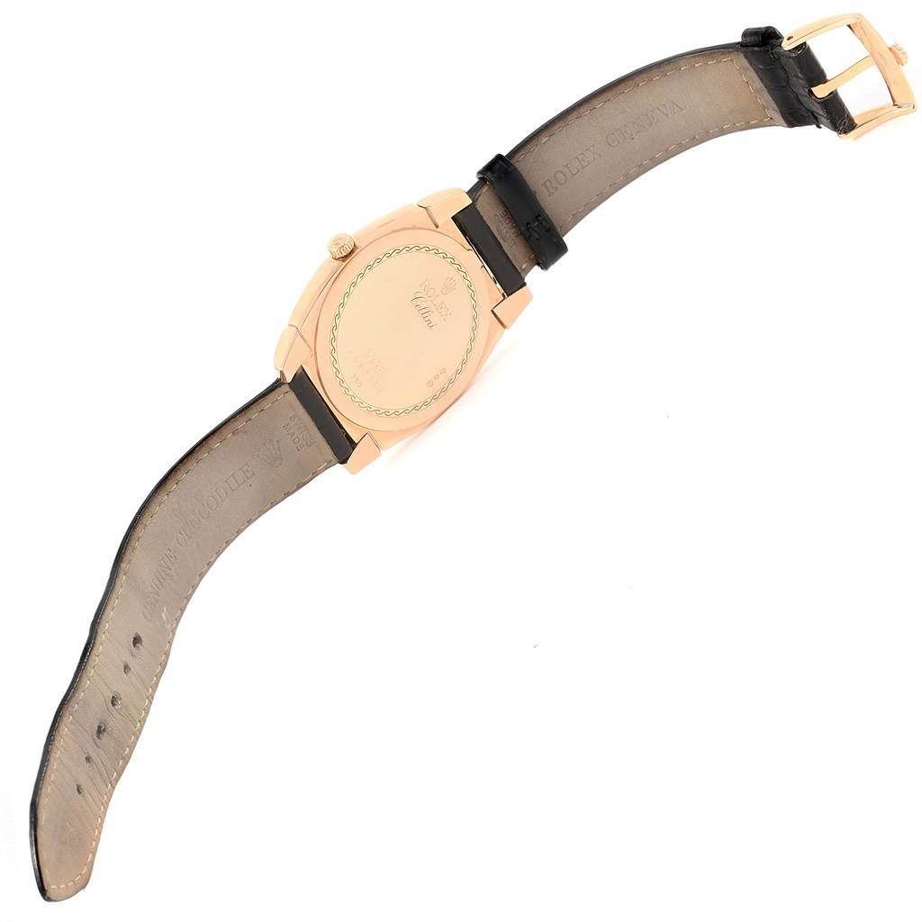 This image shows the back view of a Rolex Cellini 5330 Rose Gold Black Dial 5330 Rose Gold Black Dial watch, highlighting its case back and leather strap.