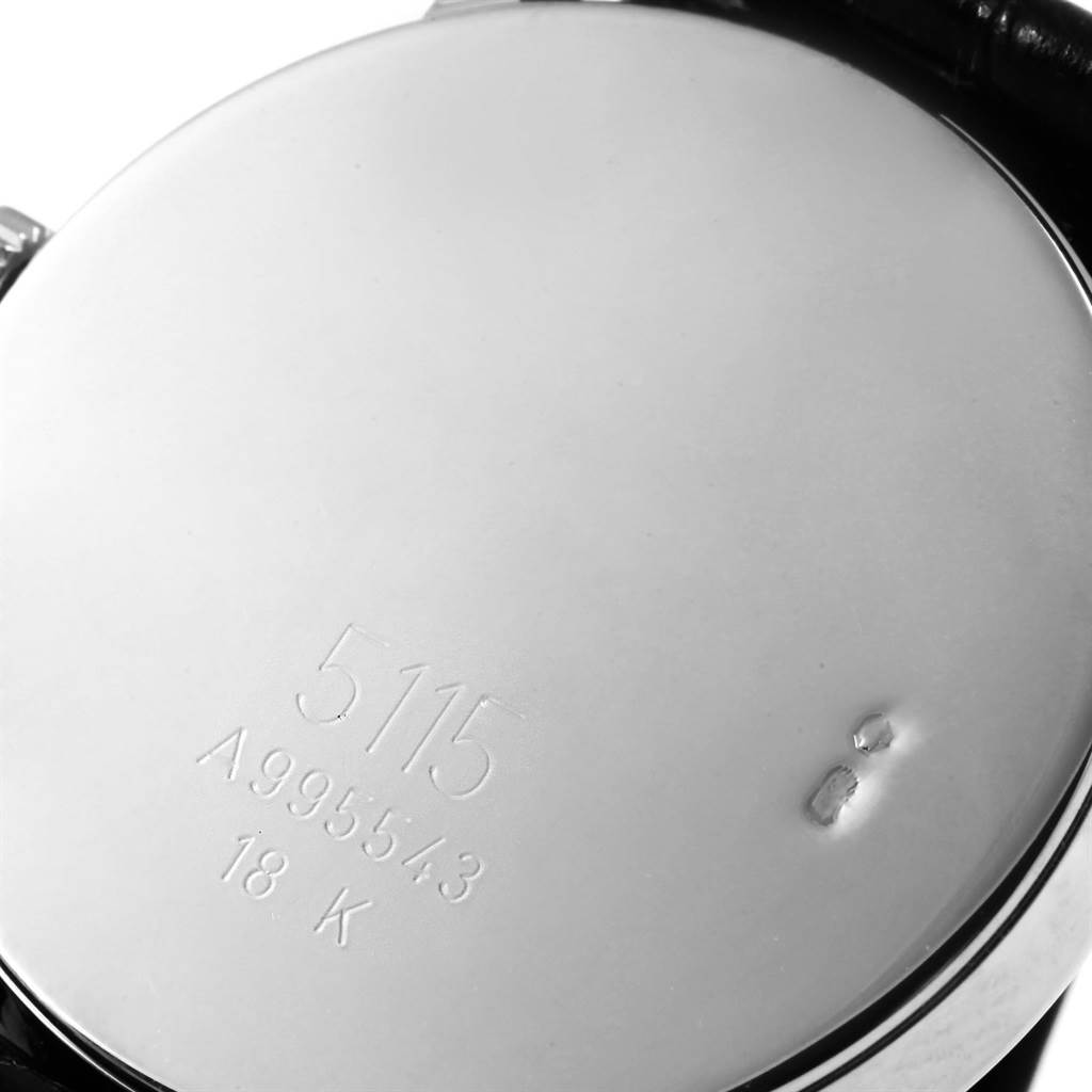 This image shows the back case of a Rolex Cellini 5115 White Gold Black Dial 5115 White Gold Black Dial model, highlighting the model number, serial number, and the 18K gold mark.