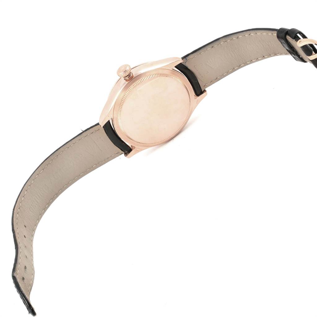 The image shows the backside and strap of a Rolex Cellini 50515 Men's Rose Gold Black Dial 50515 Men's Rose Gold Black Dial model watch, highlighting the case back and leather strap.