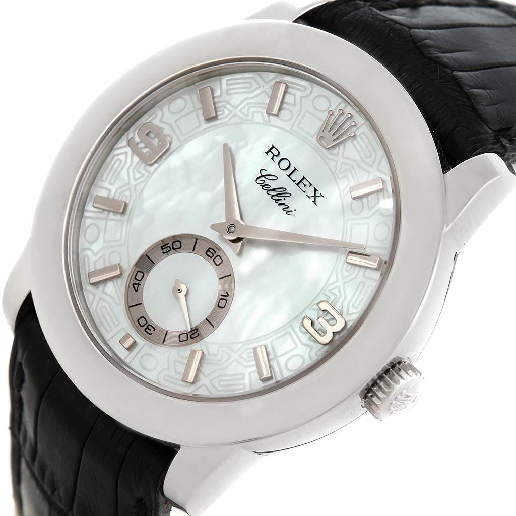 The image shows a close-up angle of the Rolex Cellini 5240 Platinum Mother of Pearl Dial 5240 Platinum Mother of Pearl Dial watch, highlighting its face, crown, and leather strap.