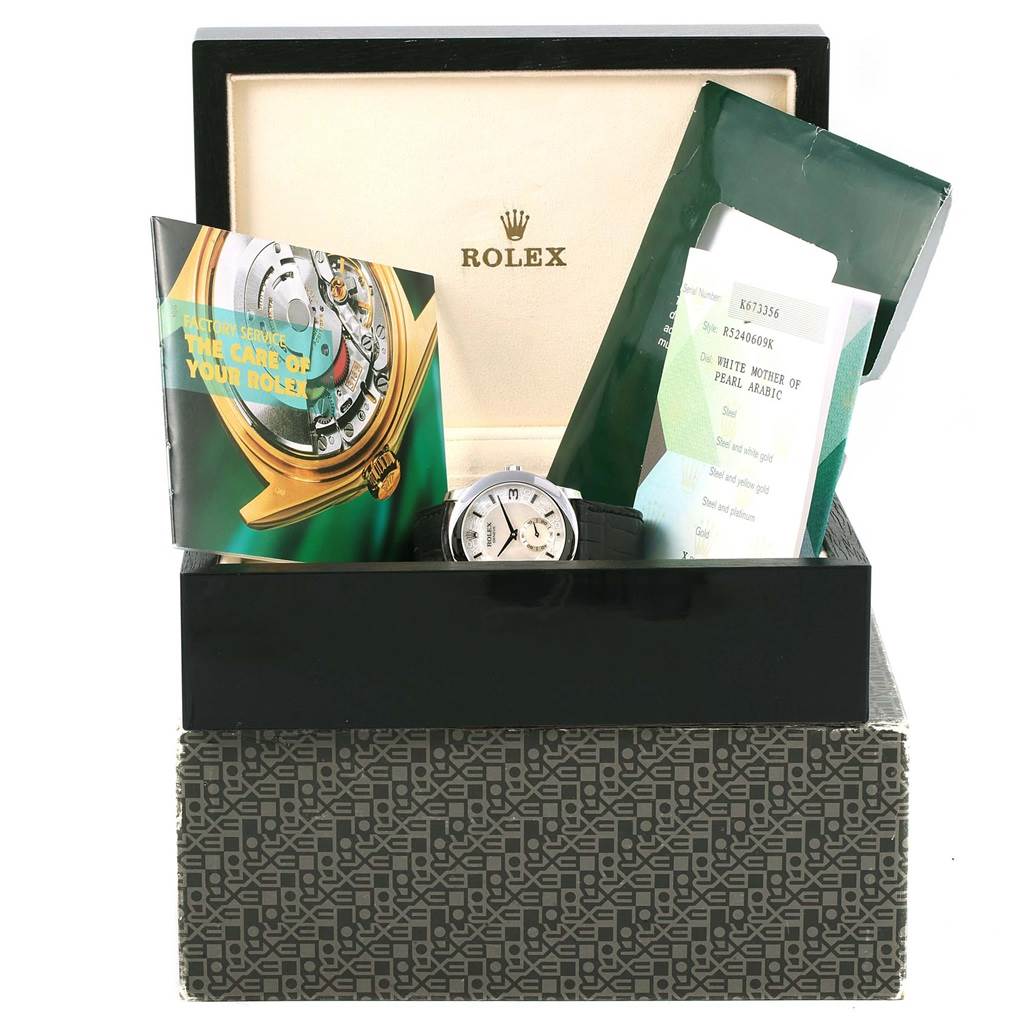The image shows a Rolex Cellini 5240 Platinum Mother of Pearl Dial 5240 Platinum Mother of Pearl Dial watch along with its open box, manuals, and warranty papers.