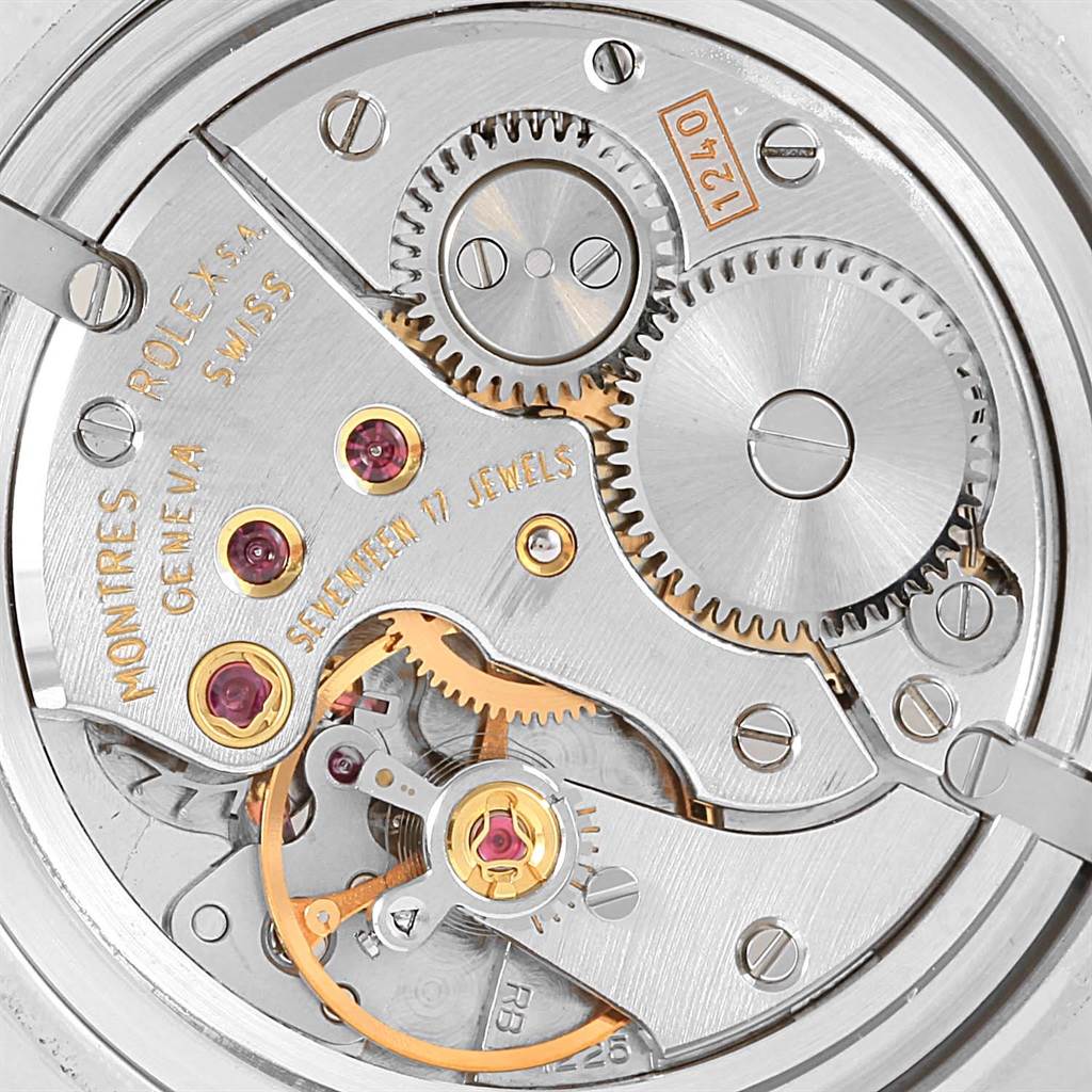 This image shows the intricate movement and internal mechanics of the Rolex Cellini 5240 Platinum Mother of Pearl Dial 5240 Platinum Mother of Pearl Dial watch from a close-up angle.