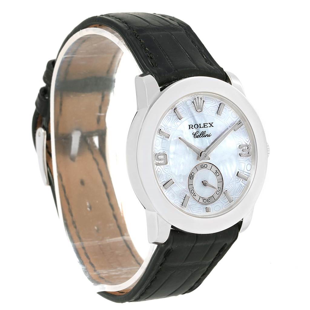 The Cellini model by Rolex is shown at a three-quarter angle, highlighting the watch face and black leather strap.