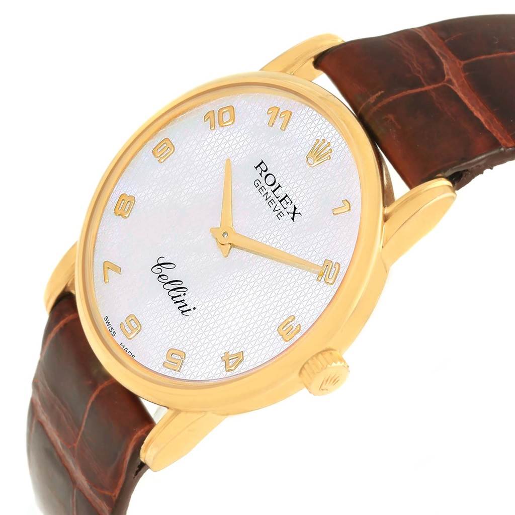 The Rolex Cellini 5116 Yellow Gold Mother of Pearl Dial 5116 Yellow Gold Mother of Pearl Dial watch is shown from an angled perspective, highlighting the face, hands, crown, and brown leather strap.