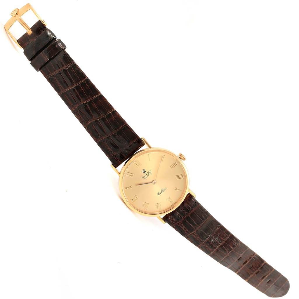 The image shows a Rolex Cellini 5112 Yellow Gold Champagne Dial 5112 Yellow Gold Champagne Dial watch angled flat with its face, strap, and buckle clearly visible.