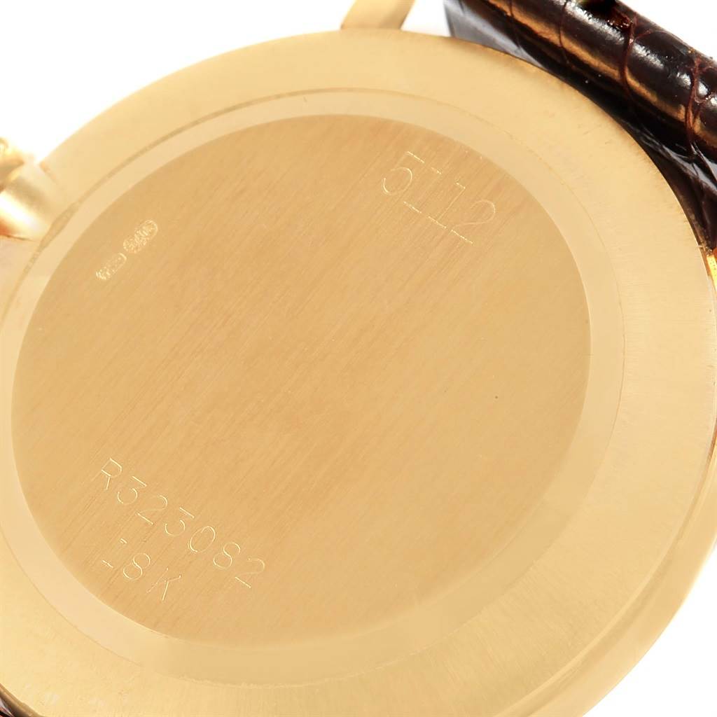 This is a rear view of the Rolex Cellini 5112 Yellow Gold Champagne Dial 5112 Yellow Gold Champagne Dial watch, showing the case back with engravings.