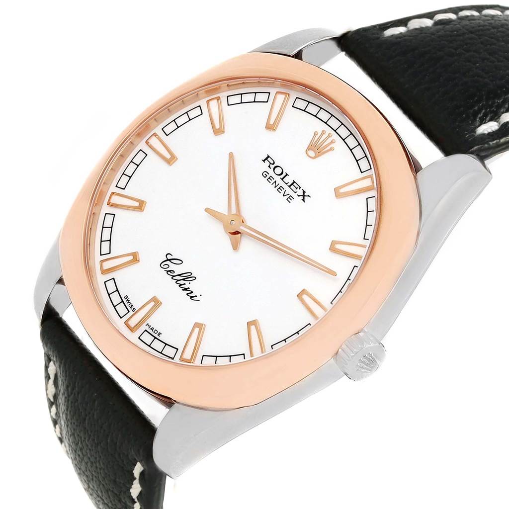 The Rolex Cellini 4243 Men
s White Gold White Dial 4243 Men
s White Gold White Dial watch is shown at a tilted angle, featuring its face, crown, and part of the black leather strap.