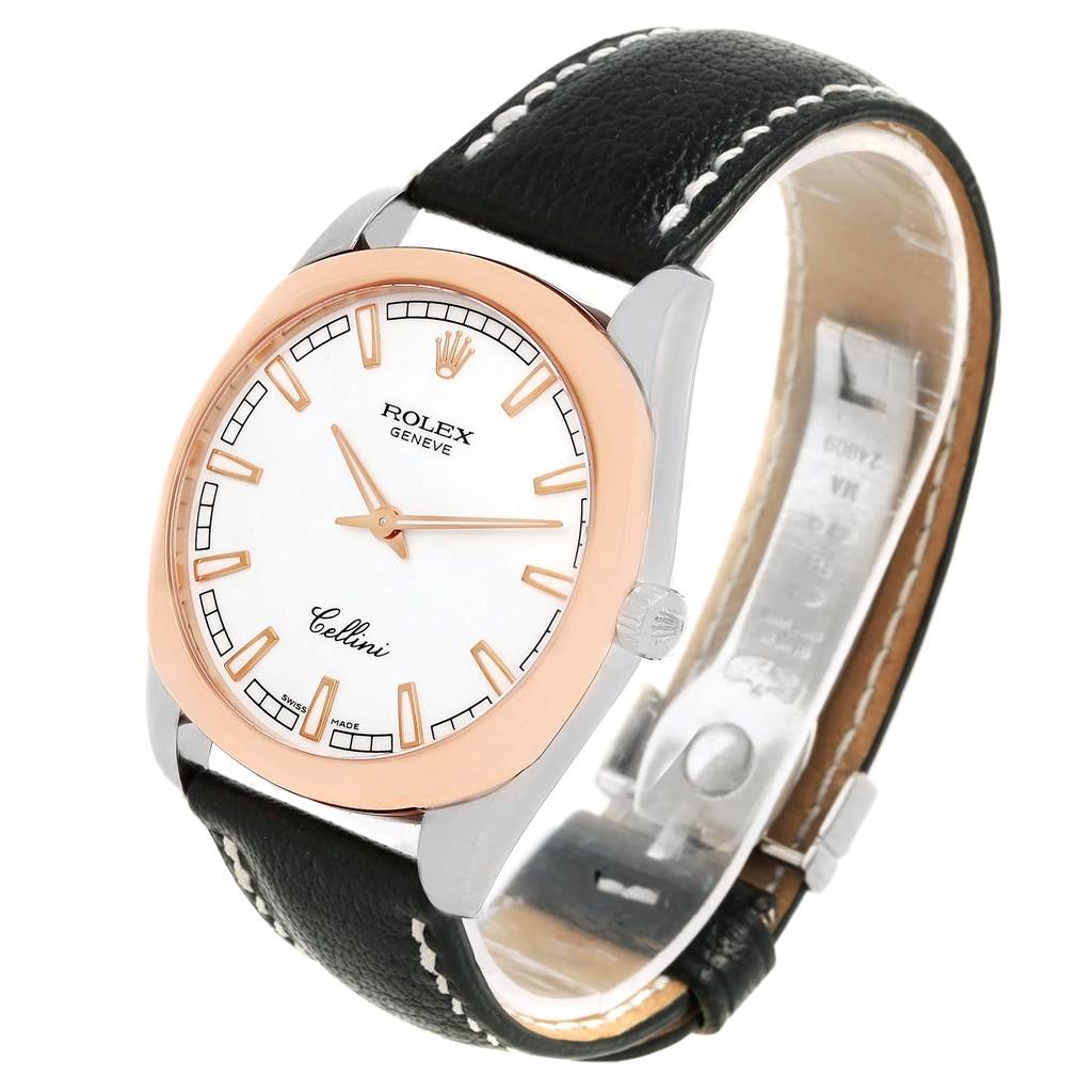 The Rolex Cellini 4243 Men
s White Gold White Dial 4243 Men
s White Gold White Dial watch is shown at an angled side view, highlighting its face, bezel, crown, and leather strap.