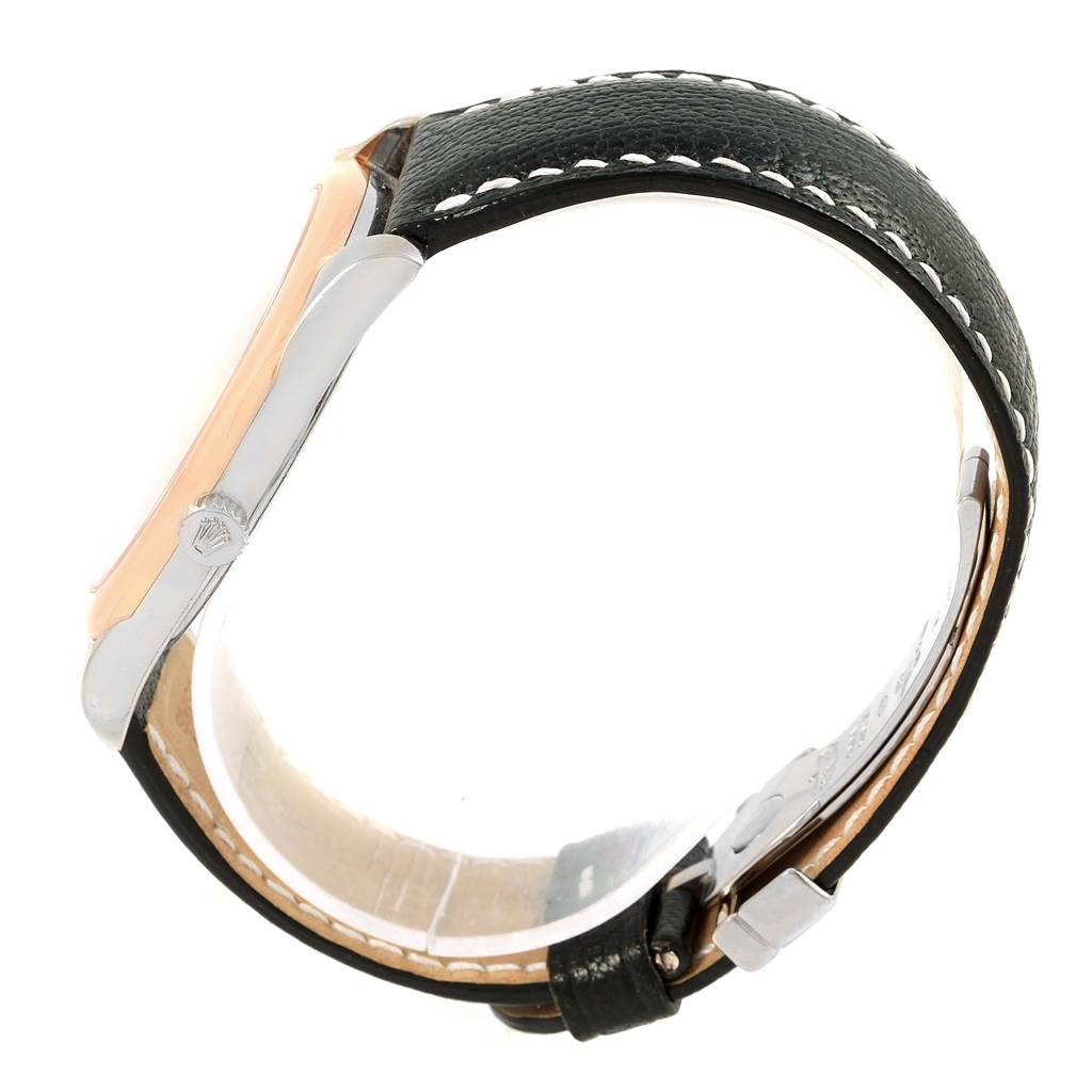 This image shows a side view of the Rolex Cellini 4243 Men
s White Gold White Dial 4243 Men
s White Gold White Dial, highlighting the case, crown, and leather strap with white stitching.