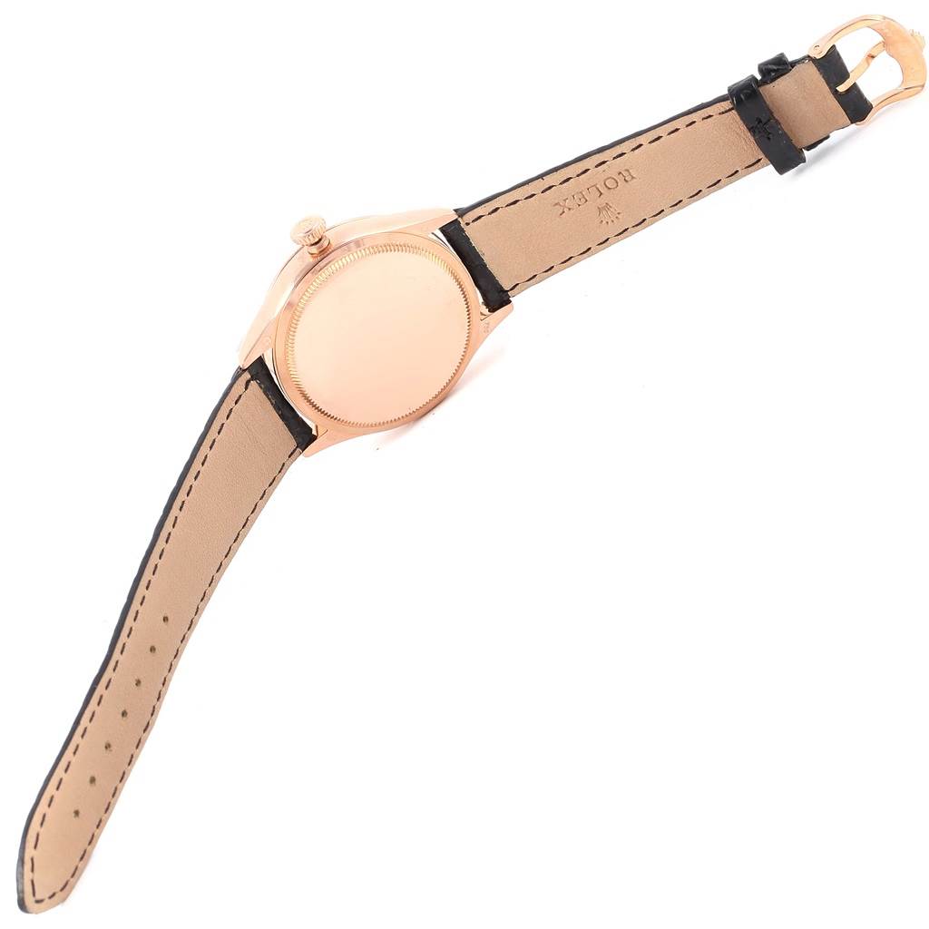 The image shows the back view of a Rolex Cellini 50515 Men's Rose Gold Silver Dial 50515 Men's Rose Gold Silver Dial watch with its strap fully extended.