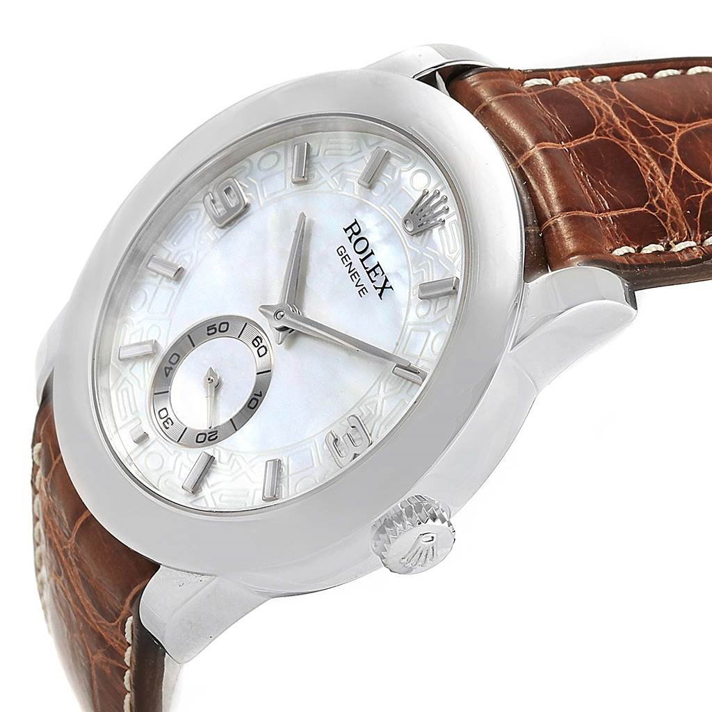 The Rolex Cellini 5240 Men's Platinum Mother of Pearl Dial 5240 Men's Platinum Mother of Pearl Dial watch is shown at an angle displaying its face, crown, and brown leather strap.