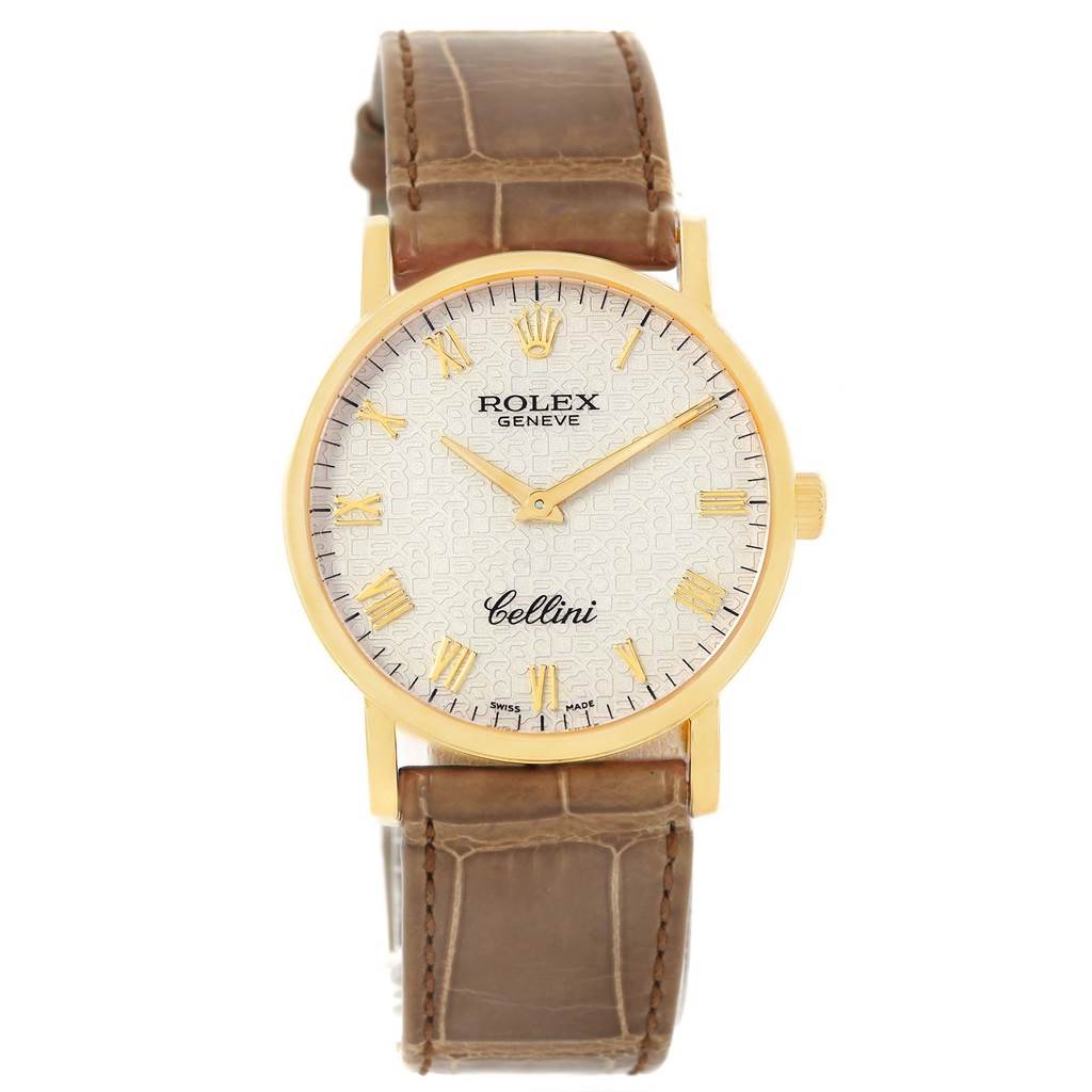 The Rolex Cellini 5115 Men's Yellow Gold Beige Dial 5115 Men's Yellow Gold Beige Dial watch is shown from a front angle, featuring a gold bezel, cream dial, and brown leather strap.