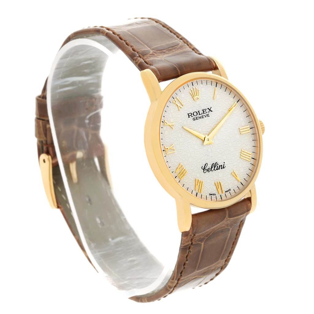 The Rolex Cellini 5115 Men's Yellow Gold Beige Dial 5115 Men's Yellow Gold Beige Dial watch is shown at a slight side angle, featuring its dial, case, and leather strap.