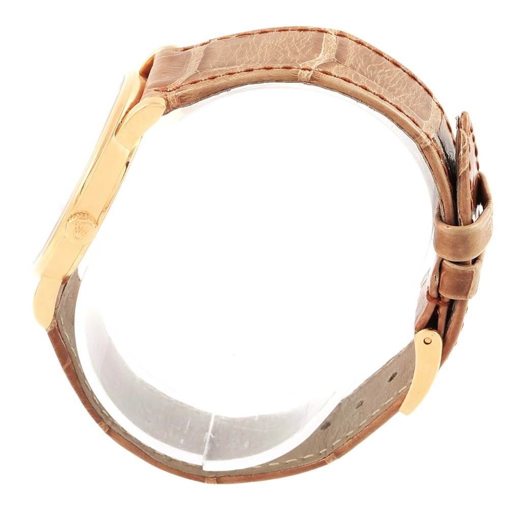 This image shows a side profile view of a Rolex Cellini 5115 Men's Yellow Gold Beige Dial 5115 Men's Yellow Gold Beige Dial watch focused on the clasp and strap.