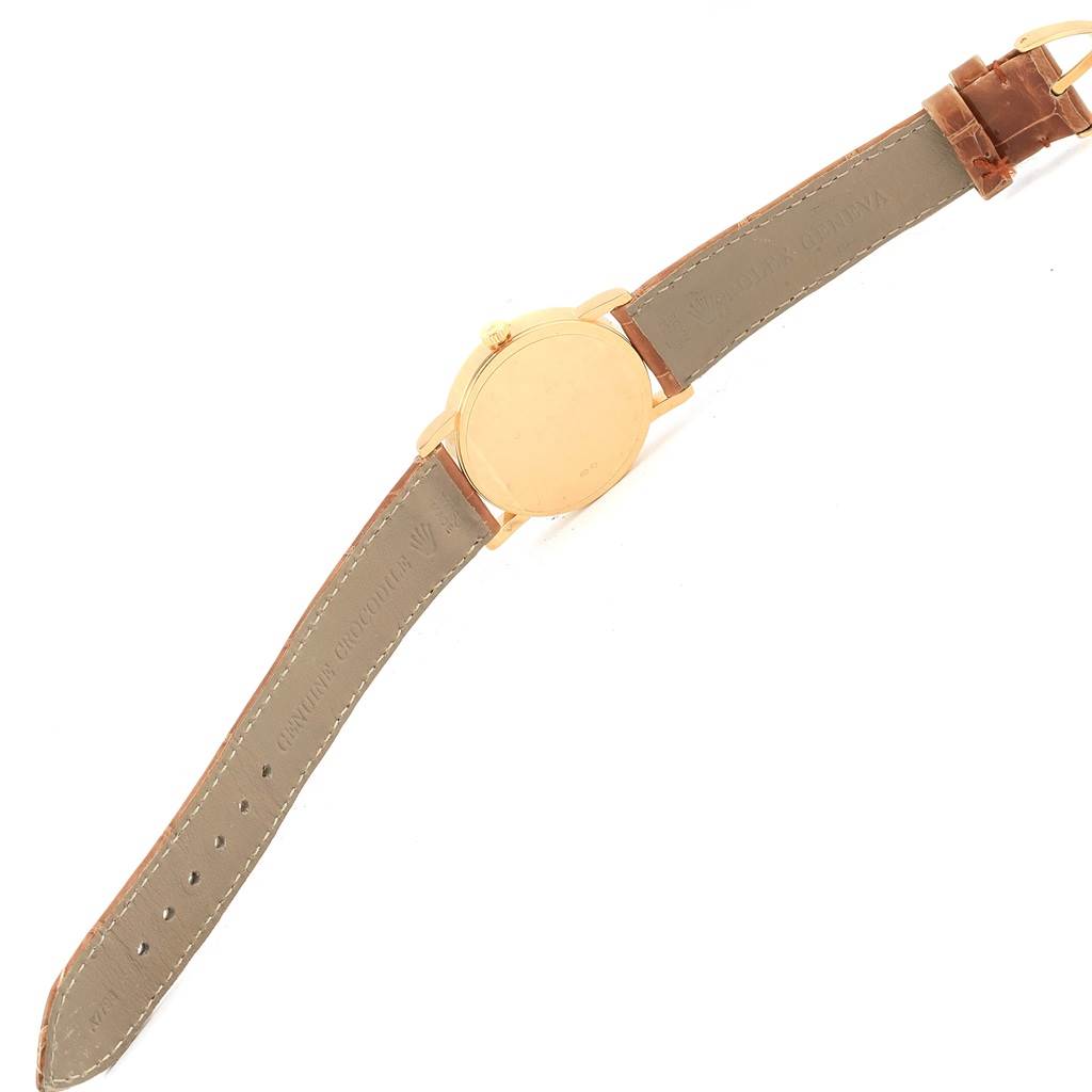 This image shows the back and leather strap of a Rolex Cellini 5115 Men's Yellow Gold Beige Dial 5115 Men's Yellow Gold Beige Dial watch at an angled view.