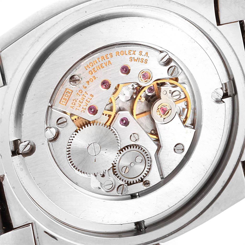 This close-up image showcases the intricate inner mechanics of a Rolex Cellini 5330 Men
s White Gold White Dial 5330 Men
s White Gold White Dial model watch.